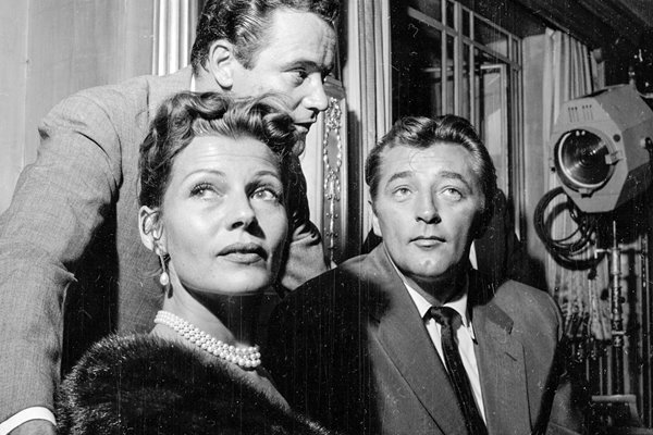 Rita Hayworth, Jack Lemmon and Robert Mitchum 1956
