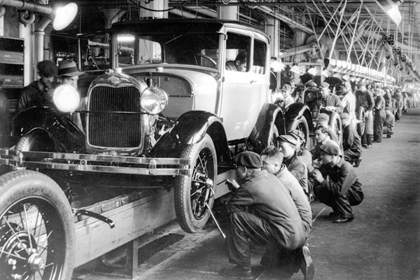 The production line at a Ford Motor Factory in the 1920s