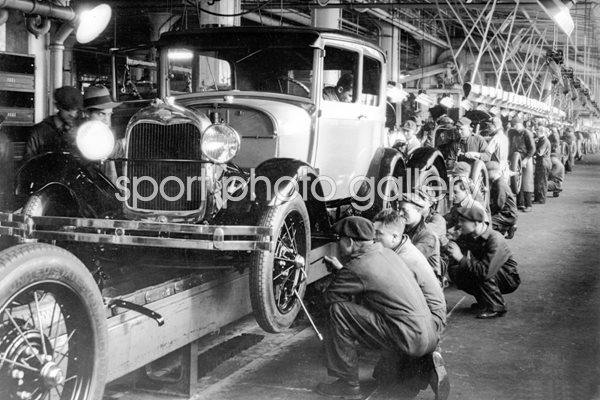 The production line at a Ford Motor Factory in the 1920s