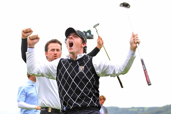 Rory & GMac celebrate huge putt on 17