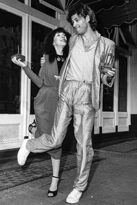 Kate Bush and Bob Geldof dance in celebration