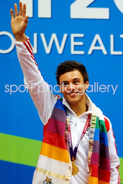 Tom Daley poses with gold medal