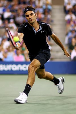 Roger Federer returns a shot 2014 US Open