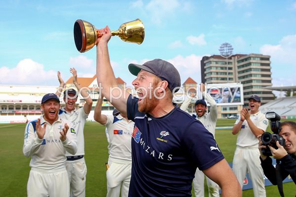 Captain Andrew Gale celebrates with Trophy