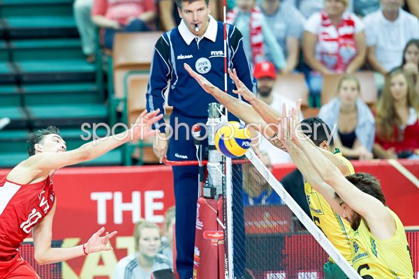Sergey Savin of Russia spikes the ball v Brazil 