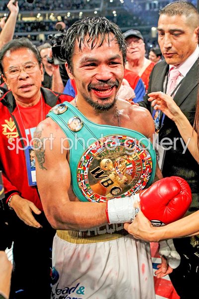 Manny Pacquiao with belts v Antonio Margarito