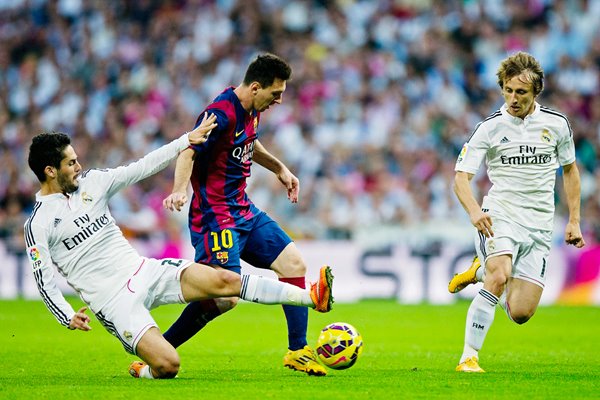 Isco Real Madrid tackles Lionel Messi Barcelona