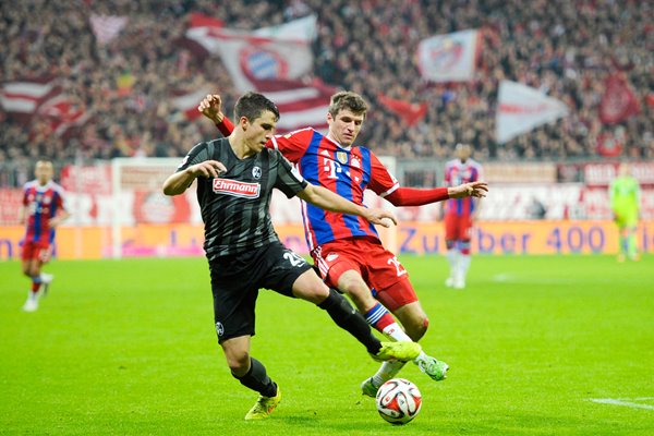 Thomas Mueller Bayern v Marc-Oliver Kempf Freiburg