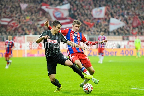 Thomas Mueller Bayern v Marc-Oliver Kempf Freiburg