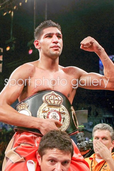 Amir Khan celebrates win v Marcos Maidana